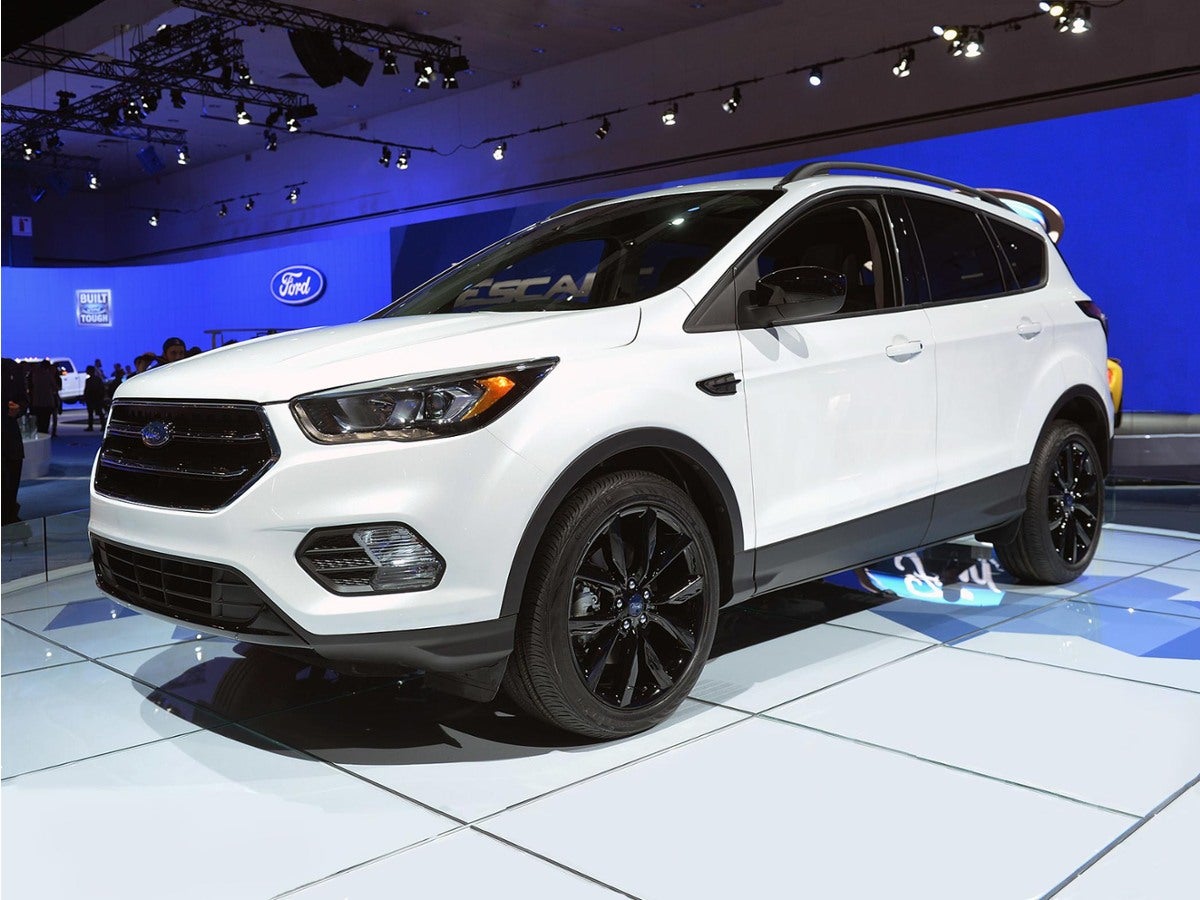 2019 Ford Escape Titanium in White Platinum Clearcoat Metallic — front three-quarter view