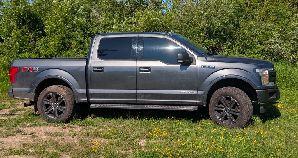 2018 Ford F-150 Lariat in Magnetic — front three-quarter view