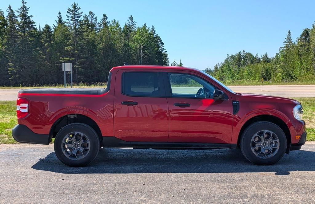 2024 Ford Maverick XLT in Hot Pepper Red Metallic Tinted Clearcoat — front three-quarter view